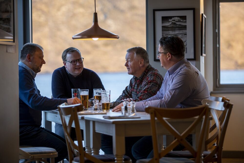 Local residents enjoying a pint at Kylesku Hotel.